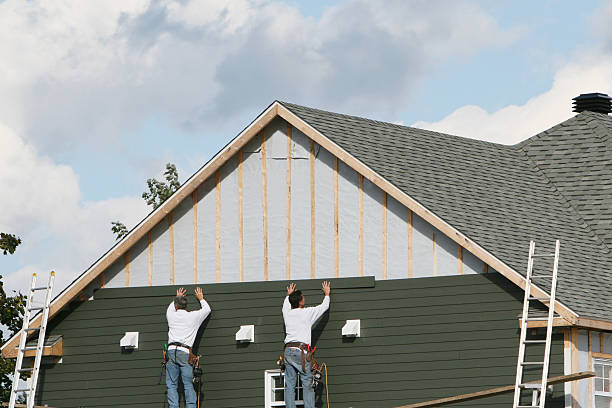 Professional Siding Installation technician working in Rogersville, PA